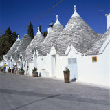 Trulli Houses of Alberobello, UNESCO World Heritage Site, Puglia, Italy, Europe Photographic Print by Tony Gervis