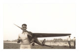 Boy with Model Airplane Posters