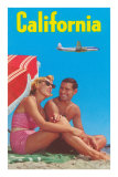 Couple on Beach with Airplane in Sky Posters