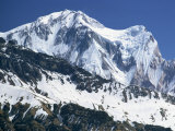 Snow Covered Peak of Annapurna in the Himalayas, Nepal Photographic Print by Nigel Callow