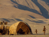 Himba Village, Purros, Namibia, Africa Photographic Print by Tom Ang