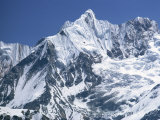 Snow Covered Peak of Annapurna in the Himalayas, Nepal Photographic Print by Nigel Callow
