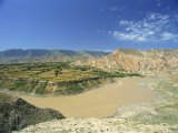 Landscape of the Yellow River, Farm Land and Hills in Qinghai, China Photographic Print by Gina Corrigan