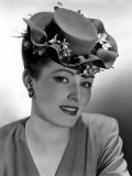 Eleanor Parker, Wearing a Flat-Crowned, Double-Brimmed Hat Nestled with Violets, 1944 Plakat