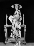 Kay Francis Modeling Floral-Print Crepe Frock with White Accessories, 1937 Poster