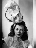 Jane Greer, Modeling an Enterprising Easter Bonnet, 1947 Affiche