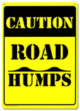 Caution:  Road Humps Targa in metallo