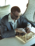 Ray Charles Playing Chess on the Tour Bus Print