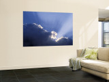 Sun Rays Through Clouds Wall Mural by Jon Arnold
