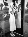 American Olympic Athlete Babe Didrikson, Trying on a Hat, Chicago, Illinois, 1932 Posters