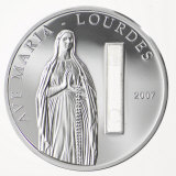Embedded water from Lourdes in a commemorative coin from Palau Photographic Print by Mark Thiessen