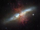 This galaxy is called the Cigar galaxy for its oblong shape Photographie par Esa And Nasa