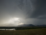 Approaching lightning storm from Waterton Park looking west Photographic Print by Michael Melford