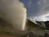 Water shoots into the air during eruptions in the Valley of Geyser Photographic Print by Michael Melford