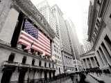 The facade of the New York Stock Exchange draped in the American Flag Photographic Print by Justin Guariglia