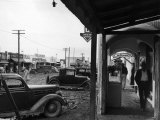 Main Street in Oil Boom Town Premium Photographic Print by Carl Mydans