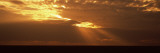 Sunlight Radiating Through Clouds at Sunset, Masai Mara National Reserve, Kenya Lámina fotográfica por Panoramic Images