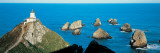 Nugget Point Lighthouse New Zealand Lámina fotográfica por Panoramic Images Nugget Point Lighthouse New Zealand Lámina fotográfica por Panoramic Images