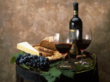 Still Life of Wine Bottle, Wine Glasses, Cheese and Purple Grapes on Top of Barrel Fotografie-Druck