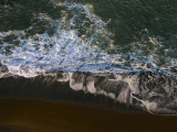 Wave Washing over Northern Californian Dark Sand, USA Photographic Print by Sandra Cannon