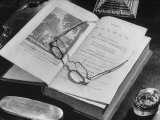 Open Pages of an Old Book, Held Down by a Pair of Steel-Rimmed Spectacles at Mt. Pleasant Lámina fotográfica