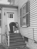 Milkman Delivering Milk to a Doorstep Photographic Print by Ralph Morse