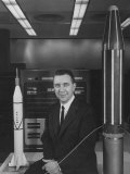 Physicist James A. Van Allen Sitting Between Models of Jupiter Physicist James A. Van Allen Sitting Between Models of Jupiter