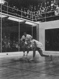 Exhibition Match During World Championship Meet in Glass Walled Court Lámina fotográfica