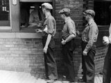 Workers Showing Tags to Enter Gate at Steel Plant Lámina fotográfica por Alfred Eisenstaedt