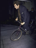 John F. Kennedy Jr. Riding on His Bike Lámina fotográfica de primera calidad