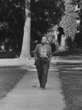 Author Vladimir Nabokov Walking Down Sidewalk Premium Photographic Print by Carl Mydans Author Vladimir Nabokov Walking Down Sidewalk Premium Photographic Print by Carl Mydans
