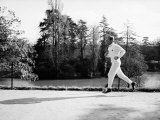 French Journalist and Politician Jean-Jacques Servan Schreiber Jogging Near Home Premium fotografisk trykk av Carlo Bavagnoli