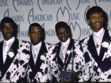 Members of Musical Group New Edition Holding their Award in Press Room at American Music Awards Lámina fotográfica de primera calidad por Kevin Winter