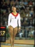 US Gymnast Ludmila Turishcheva Performing a Floor Exercise During the Summer Olympics Lámina fotográfica de primera calidad por John Dominis US Gymnast Ludmila Turishcheva Performing a Floor Exercise During the Summer Olympics Lámina fotográfica de primera calidad por John Dominis