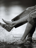 Couple Splashing Water withFeet Pósters Couple Splashing Water withFeet Pósters