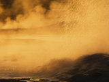 Spasm Geyser Erupting at Sunset, Lower Geyser Basin, Yellowstone N.P. Wy Photographic Print by Adam Jones