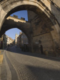 Cobblestone Walkway from Charles Bridge Through Little Quarter Bridge Tower, Prague, Czech Republic Photographic Print by Adam Jones