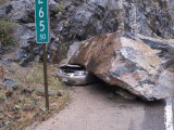 Heavy Rain Causes a Sixty Ton Rock to Fall on a Car on the Colorado Front Range Impressão fotográfica por Jon Van de Grift Heavy Rain Causes a Sixty Ton Rock to Fall on a Car on the Colorado Front Range Impressão fotográfica por Jon Van de Grift