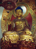 Statue of the Buddha in the Main Hall of the Ling Yinx Temple, Ming Dynasty, Hangchow, China Photographic Print by Ursula Gahwiler