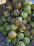 Close-Up of a Pile of Green Coconuts Photographic Print by Michelle Garrett