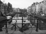 Black and White Imge of an Old Bicycle by the Singel Canal, Amsterdam, Netherlands, Europe Photographic Print by Amanda Hall
