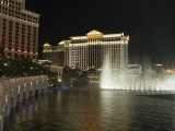 Bellagio Hotel in Forground with Caesar's Palace in Background at Night, Las Vegas, Nevada, USA Photographic Print by Robert Harding Bellagio Hotel in Forground with Caesar's Palace in Background at Night, Las Vegas, Nevada, USA Photographic Print by Robert Harding