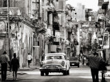 Busy Street Showing Dilapidated Buildings, Old American Cars and Local People, Havana, Cuba Photographie par Lee Frost
