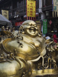 Golden Statue of a Reclining Laughing Buddha, Hangzhou, Zhejiang Province, China Photographic Print by Kober Christian