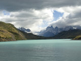 Two Towers Stand in Front of Rio Paine in Torres Del Paine National Park, Chile, South America Photographie par McCoy Aaron