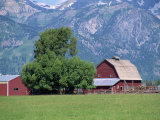 Farm Buildings with Mountain Slopes Behind, Jackson Hole, Wyoming, USA Photographic Print by Mcleod Rob