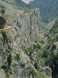 Walkers on a Narrow Mountain Road Above the Cares Gorge in the Picos De Europa, Cantabria, Spain Photographic Print by Maxwell Duncan