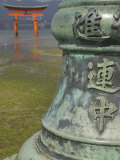 Bronze Pole with Chinese Characters in Foreground, Itsuku Shima Jinja, Miyajima, Honshu, Japan Photographic Print by Simanor Eitan