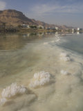 Sea and Salt Formations with Hotels and Desert Cliffs Beyond, Dead Sea, Israel, Middle East Photographic Print by Simanor Eitan