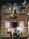 Bird Cage and Washing Lines in the Old City of Istanbul, Turkey Photographic Print by Ryan Peter
